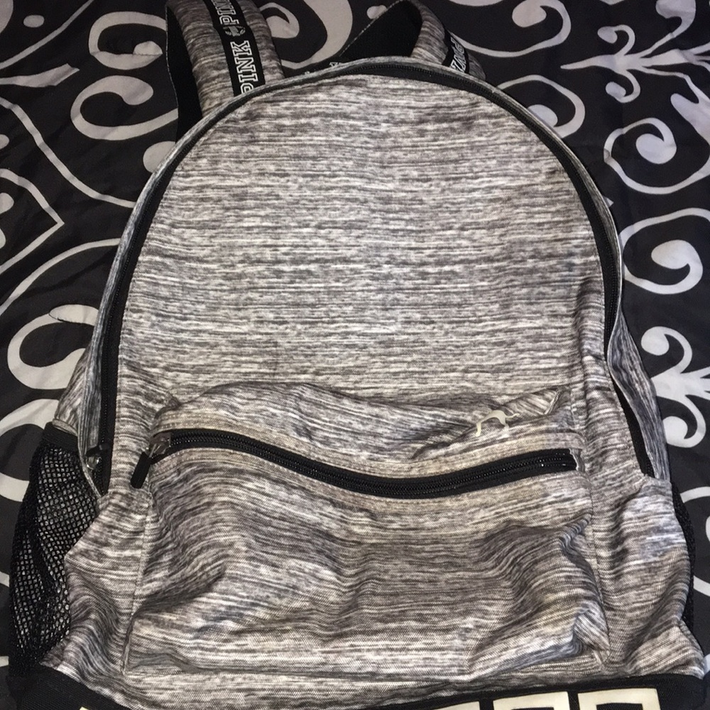 Pink backpack with four pockets